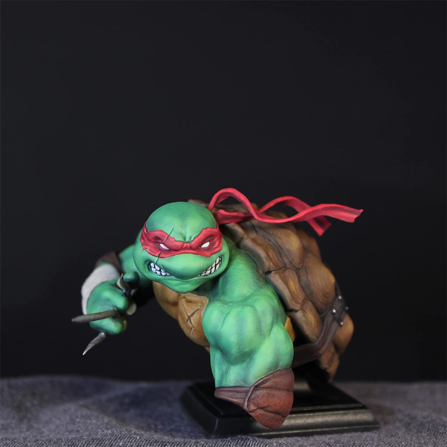 Unpainted 1/9 scale Raphael resin bust kit featuring detailed sculpting of the TMNT character, ready to assemble and paint.