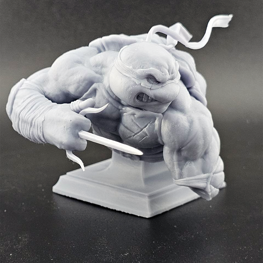 Unpainted 1/9 scale Raphael resin bust kit featuring detailed sculpting of the TMNT character, ready to assemble and paint.