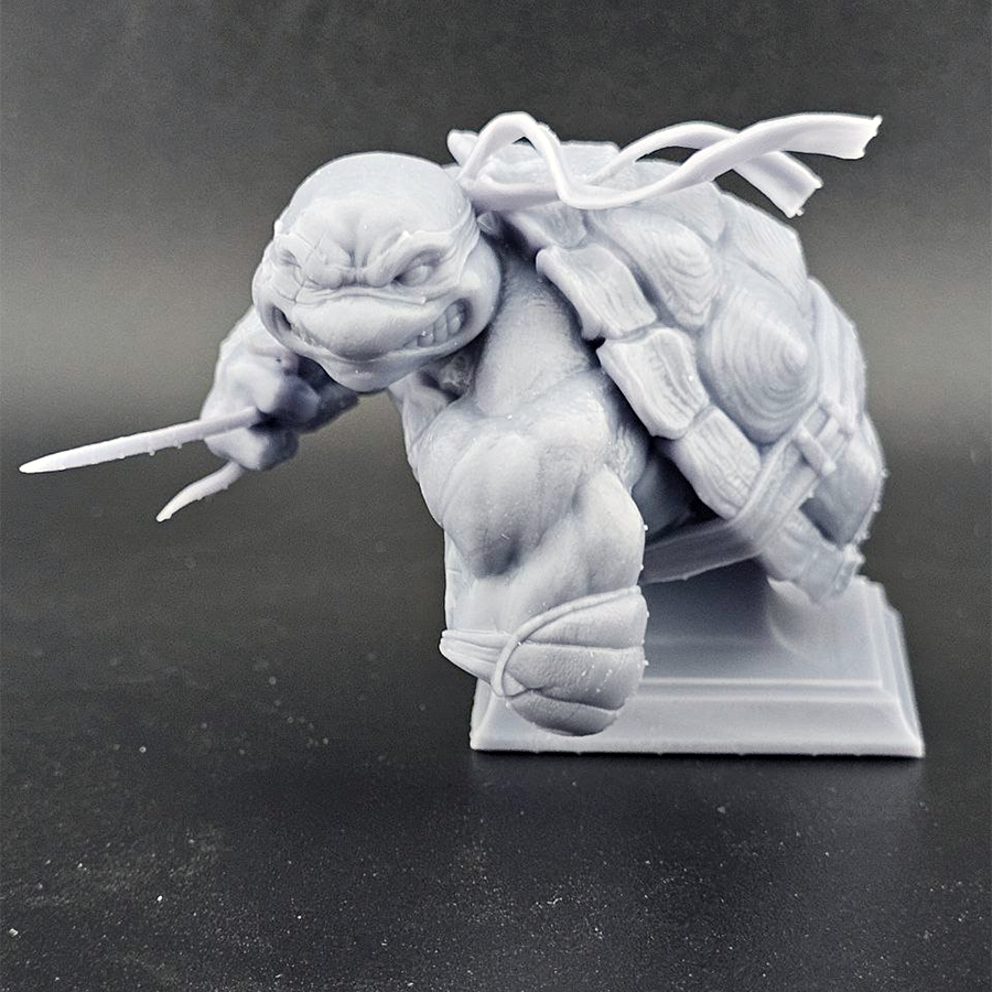 Unpainted 1/9 scale Raphael resin bust kit featuring detailed sculpting of the TMNT character, ready to assemble and paint.