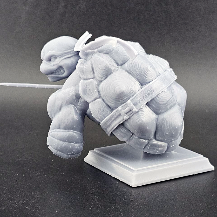 Unpainted 1/9 scale Raphael resin bust kit featuring detailed sculpting of the TMNT character, ready to assemble and paint.