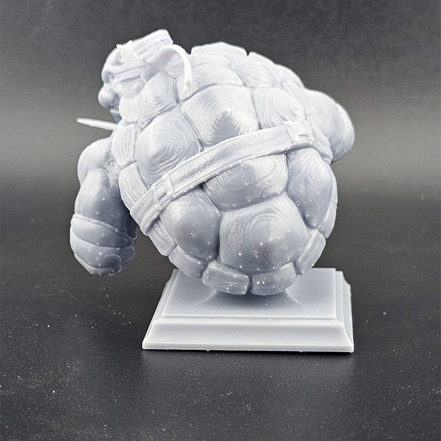 Unpainted 1/9 scale Raphael resin bust kit featuring detailed sculpting of the TMNT character, ready to assemble and paint.