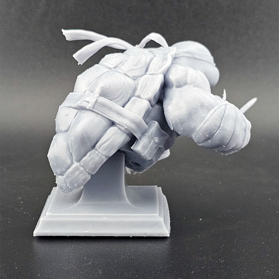 Unpainted 1/9 scale Raphael resin bust kit featuring detailed sculpting of the TMNT character, ready to assemble and paint.