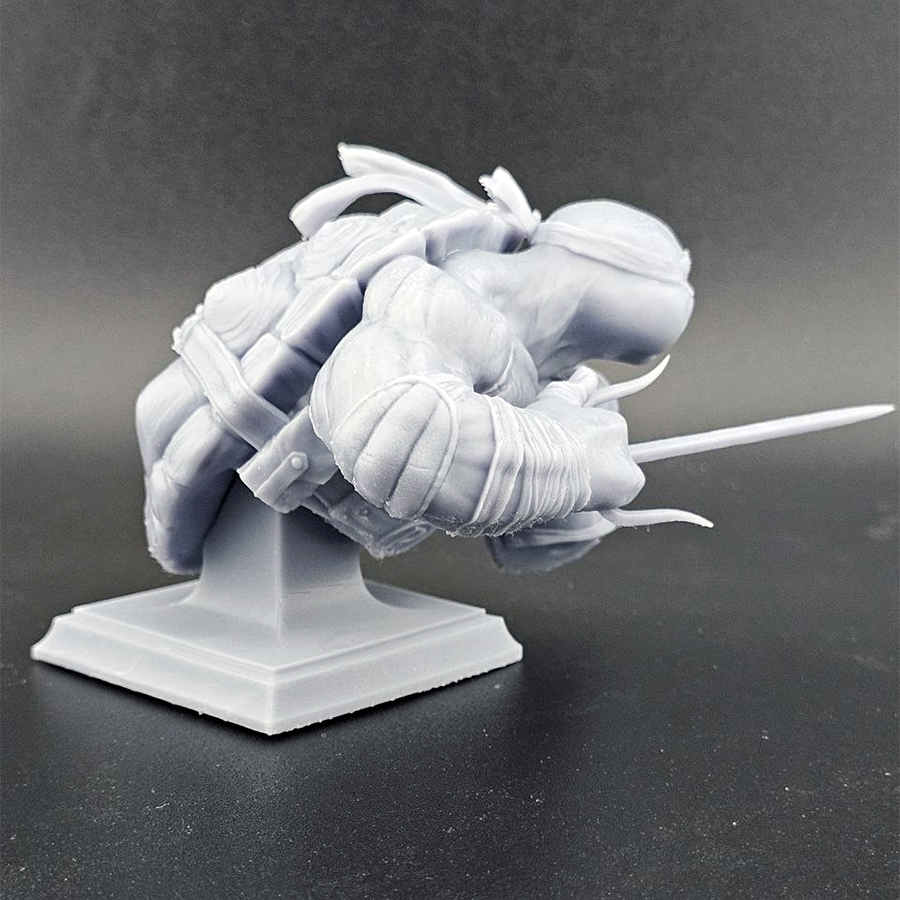 Unpainted 1/9 scale Raphael resin bust kit featuring detailed sculpting of the TMNT character, ready to assemble and paint.