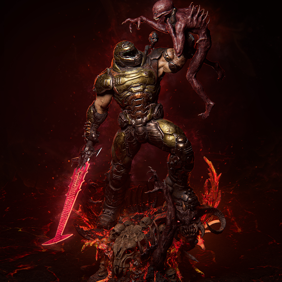 Doom resin figure holding a sword and creature above a skull-covered base