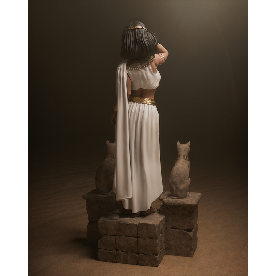Resin figure of Cleopatra in ancient Egyptian dress, standing on themed base