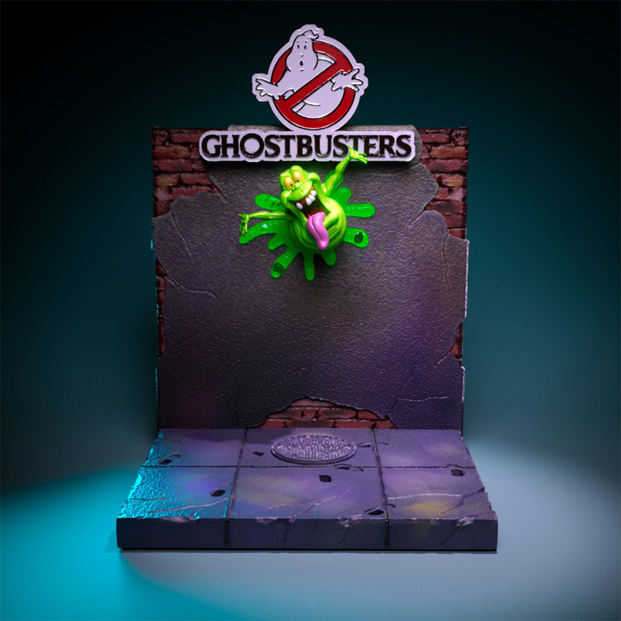 Full Real Ghostbusters diorama with all four characters, city base, Slimer busting through wall, and Ghostbusters logo on top