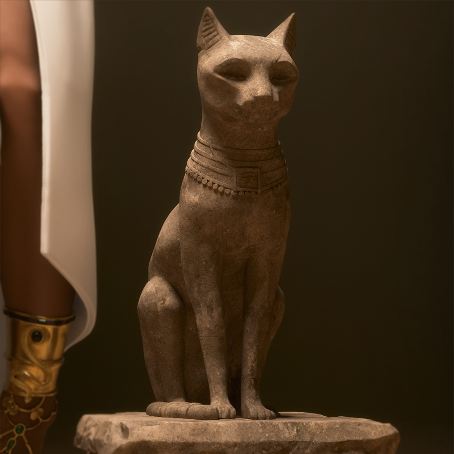Resin figure of Cleopatra in ancient Egyptian dress, standing on themed base