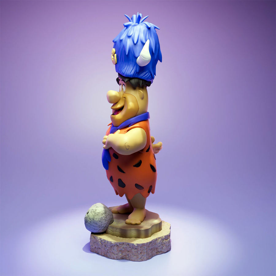 Fred Flintstone resin figure with lodge hat and bowling ball on a themed base