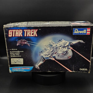 Open box AMT ERTL Star Trek 1/323 scale model kit previously worked on for lighting with missing clear window parts and missing part 9