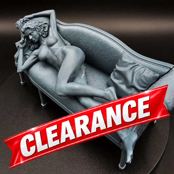 1/10 scale resin figure on detailed couch with pillows, unpainted and unassembled, clearance item.