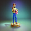 Archie resin figure printed by HLI3DFX, sculpted by UEL Winner, featuring a smiling cartoon guitarist standing on a round display base with Archie nameplate and music notes