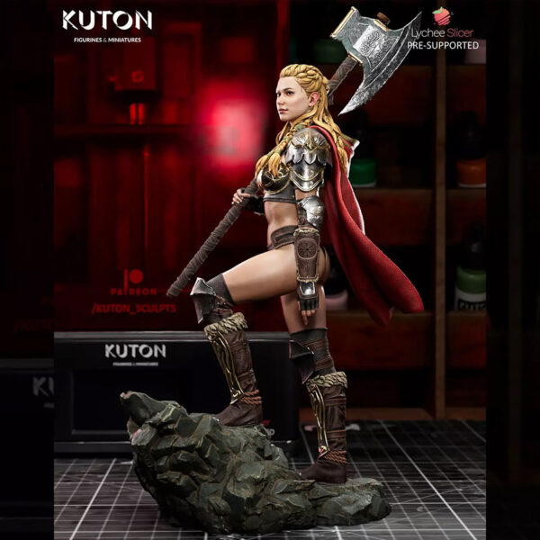 Eydis Thorne resin print by Kuton Sculpts with fantasy armor, cape, and battle axe on a rocky base