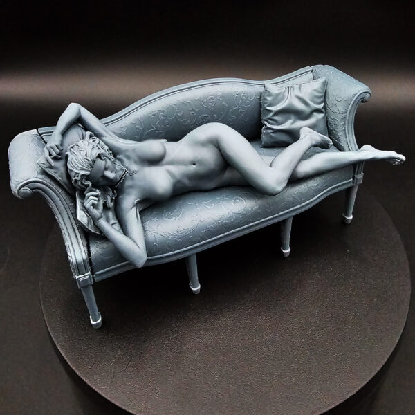 1/10 scale resin figure on detailed couch with pillows, unpainted and unassembled, clearance item.