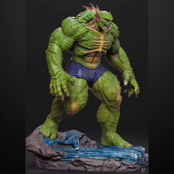 Abomination unpainted resin monster figure on a rocky base with flowing slime effect.