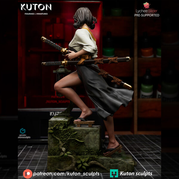 Kira Mekai resin print by Kuton Sculpts with sword, flowing outfit details, and a scenic lantern-style base