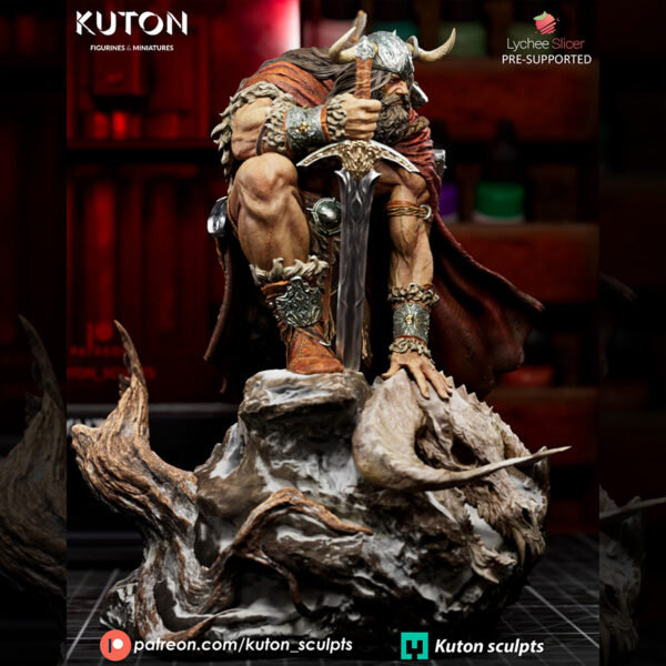 Draven by Kuton Sculpts, 1/10 scale resin print warrior crouched on a rocky base with sword, cloak, and ram skull trophy